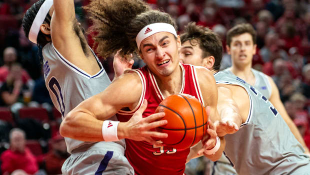Jan 20, 2024; Lincoln, Nebraska, USA; Nebraska Cornhuskers forward Josiah Allick (53) drives against Northwestern Wildcats guard Boo Buie (0) and forward Luke Hunger (33) during the first half at Pinnacle Bank Arena.
